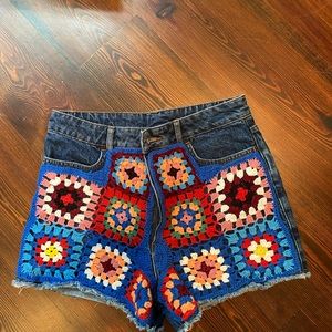 Denim shorts with crochet on front